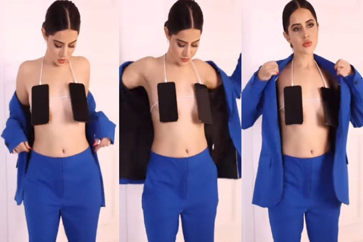 Urfi Javed Latest Video: कपड़ों की जगह दो मोबाइल फोन लटकाकर निकलीं उर्फी जावेद, यूजर्स बोले- लैपटॉप का स्कर्ट भी बना लेती