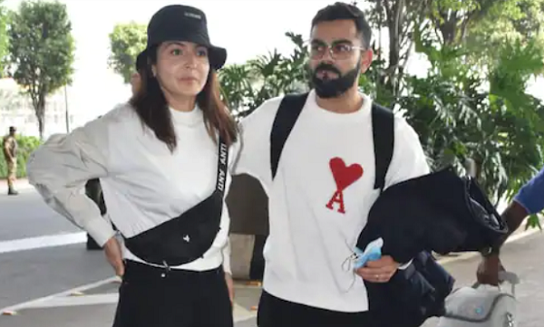 अनुष्का शर्मा के नाम की टी-शर्ट पहने नजर आए विराट कोहली, एयरपोर्ट पर हुए स्पॉट, देखें Photos