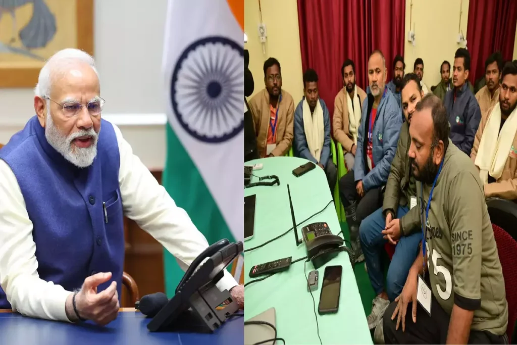 श्रमिकों से फोन पर बात करते हुए पीएम मोदी