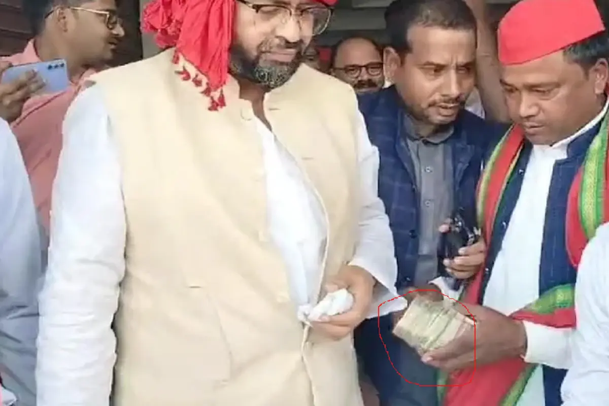 SP candidate seen distributing wads of notes