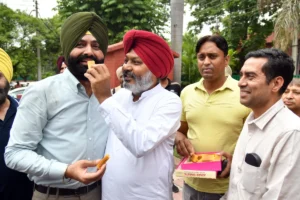 Jalandhar: Punjab finance Minister and AAP leader Harpal Singh Cheema with party workers celebrate the victory of party's Jalandhar West candidate Mohinder Bhagat Jalandhar Assembly by-poll election in Jalandhar on Saturday, July 13 , 2024. (Photo/IANS/X/@mohinderbhagat_)