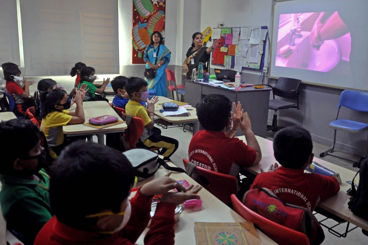 Kolkata: Teacher gives children a class about 'Corona virus' during awareness and safety precaution at a City School in Kolkata on March 11, 2020. (IANS/ Kuntal Chakrabarty)