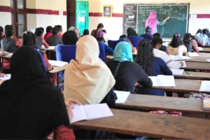 Bengaluru: Students attend classes while wearing masks after schools reopened post a gap of nine months amid COVID-19 safety measures, in Bengaluru on Jan 6, 2021. (Photo: IANS)