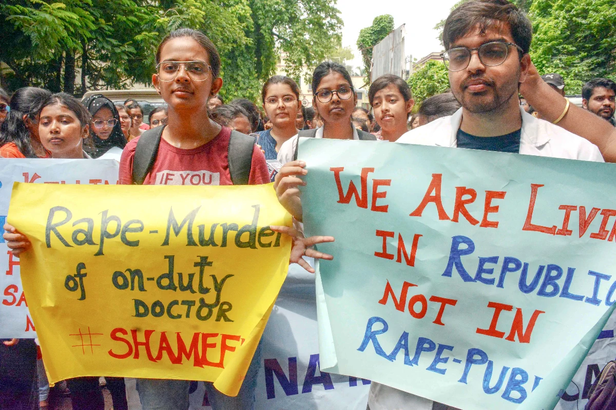 Caption: Patna: Doctors raise slogans and stage a protest condemning the rape and murder of a young medic in Kolkata at Patna Medical College in Patna on Tuesday August 13 2024. (Photo: IANS/Indrajit Dey)