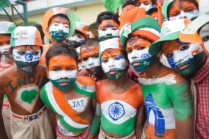 Children painted their bodies in the colours of the national flag pose for photos during the 78th Independence Day celebrations in Moradabad on Thursday, August 15, 2024. (Photo: IANS) 