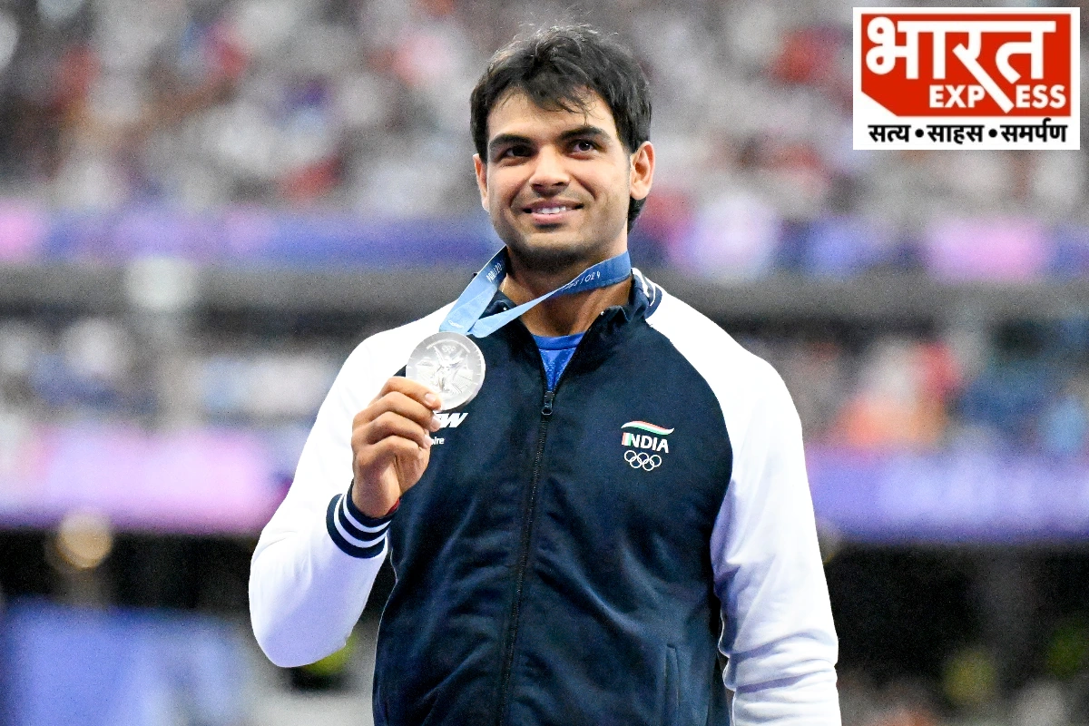 Title : Paris: Men's Javelin throw medal ceremony at the Paris Olympics 2024 Caption : Paris: Men's Javelin silver medalist Neeraj Chopra of India on the podium during the medal ceremony at the Paris Olympics 2024, in Paris, France, on Friday, August 9, 2024. (Photo: IANS/Biplab Banerjee)