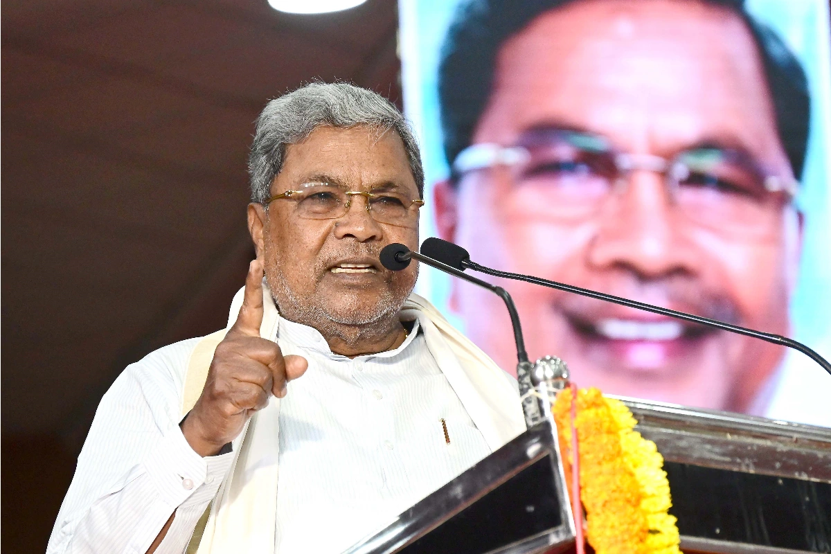 Caption: Bengaluru: Karnataka Chief Minister Siddaramaiah addresses the gathering during his felicitation program organized by the Government Workers Association at Palace Grounds in Bengaluru, on Saturday, August 17, 2024. (Photo: IANS)