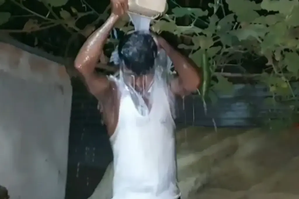 Assam Man Takes Milk Bath