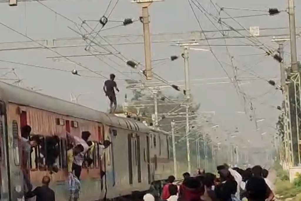 Ayodhya Youth Climbs On Roof Of Sealdah Express Train High Tension Wire