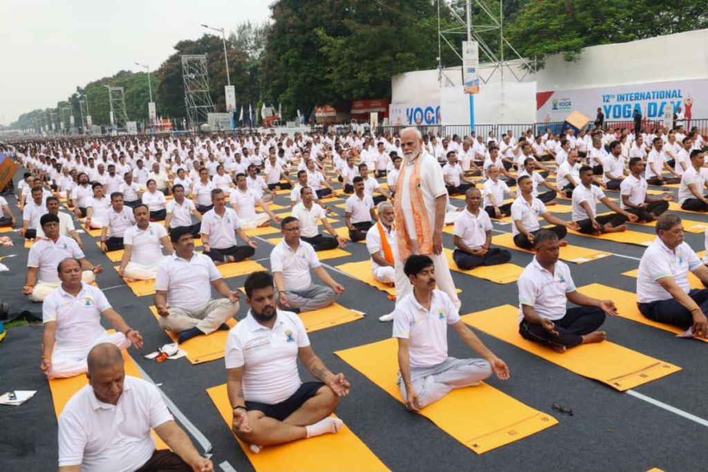 PM Modi Performs Yoga At Kolkata Red Road On 12th International Yoga Day