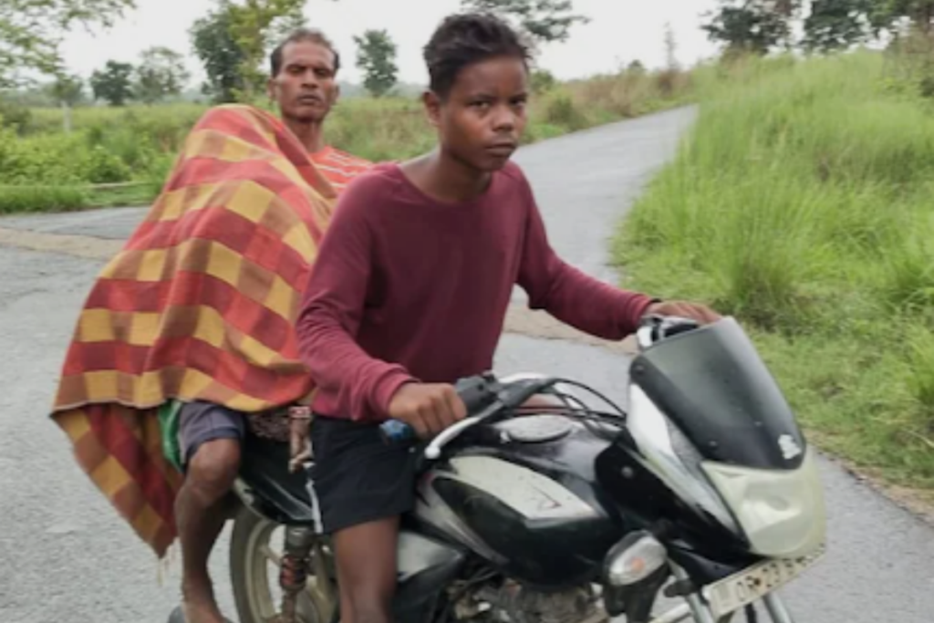 Odisha Shame Man Carries Wife's Dead Body On Motorcycle In Jharsuguda